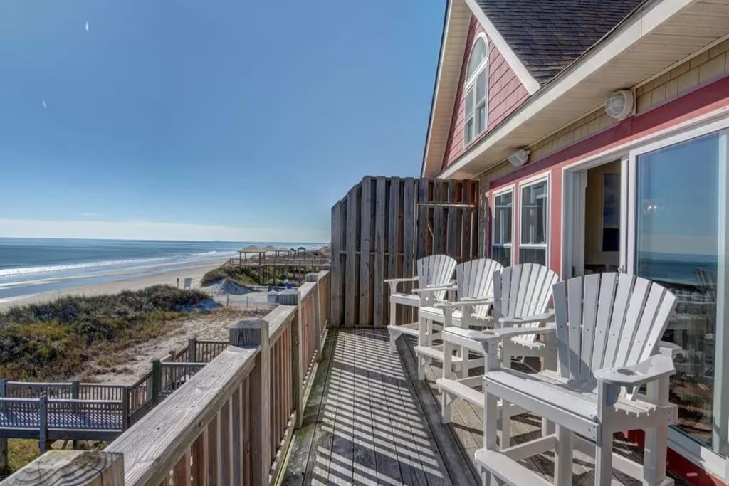 Oceanfront deck with Adirondack chairs at Seaside Sanctuary